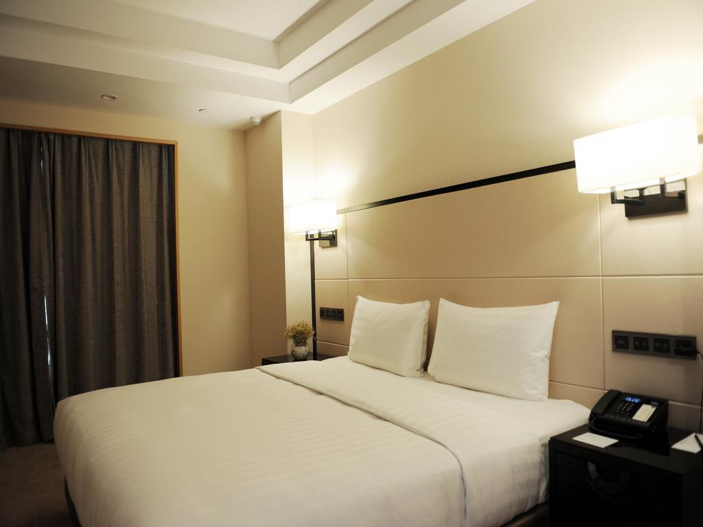 Pullman Qingdao Ziyue Hotel Exterior foto