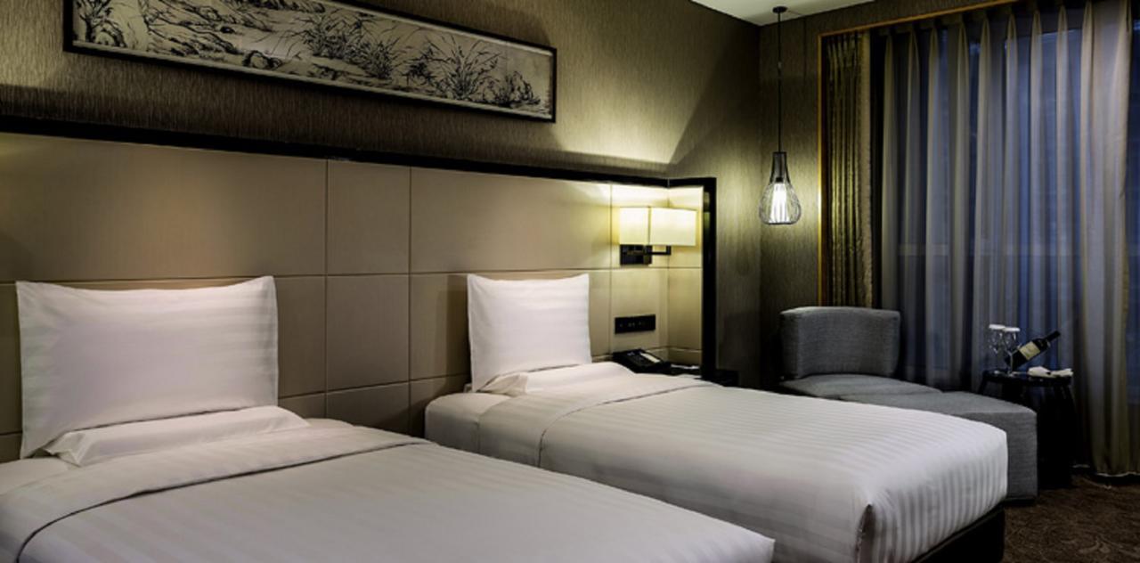 Pullman Qingdao Ziyue Hotel Exterior foto